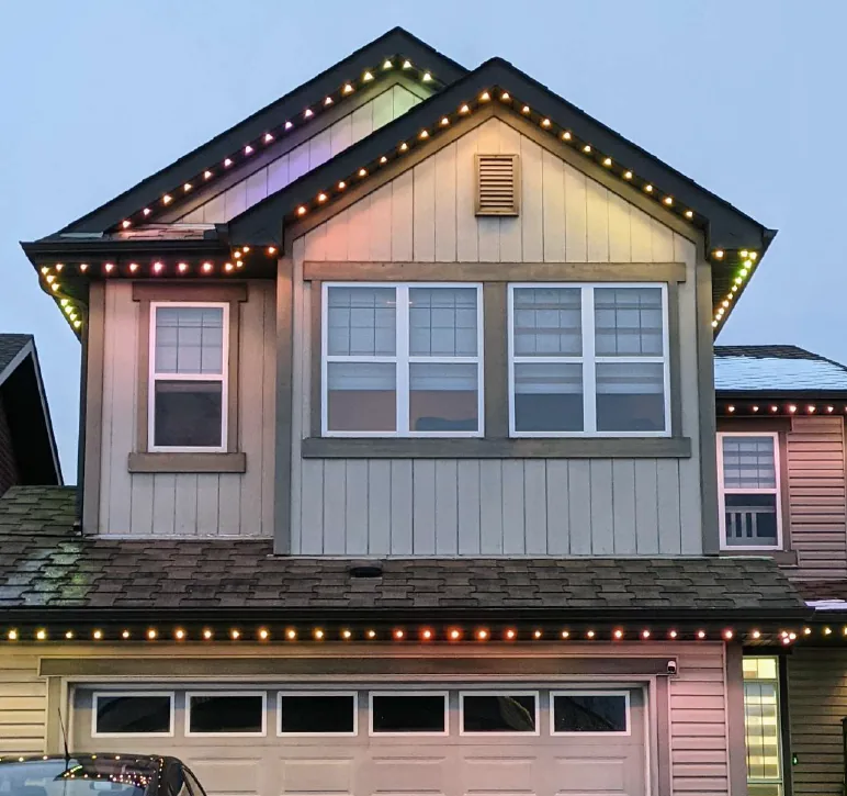 Warm white Watts permanent lighting on Castle Rock home